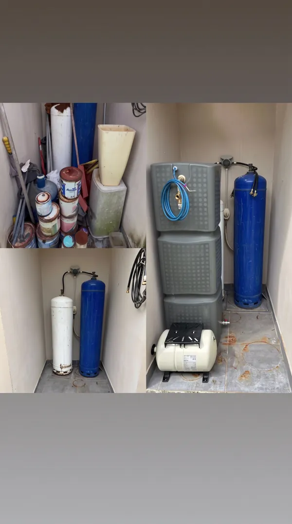 Installation d'une citerne modulaire verticale et d'un surpresseur dans un local technique.
